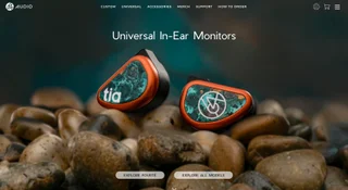 64 Audio home page section titled 'Universal In-Ear Monitors' showing copper and turquoise tia monitors resting on river stones, with Explore Fourté and Explore all models buttons